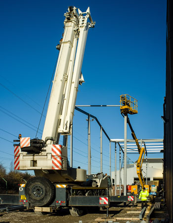 Crane and cherry picker at Chester construction site