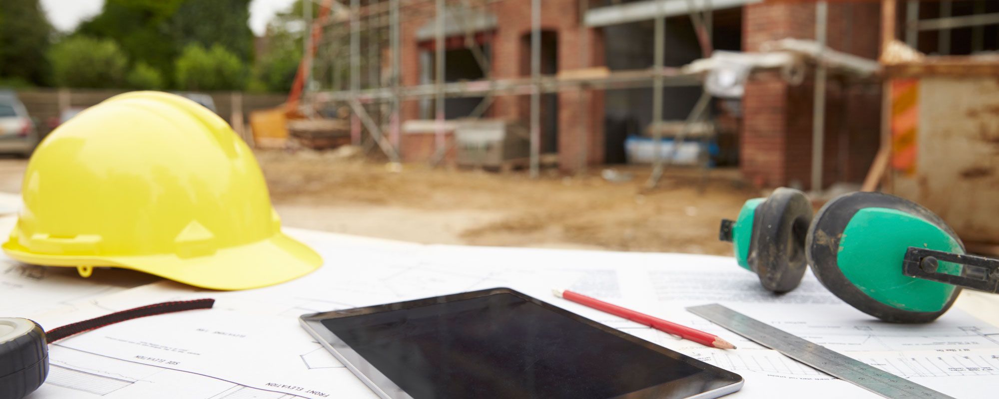 Hard hat, tablet and other construction Equipment on site in Chester